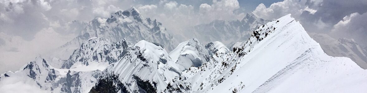 Jagged peaks in the background from the top of Satopanth summit.